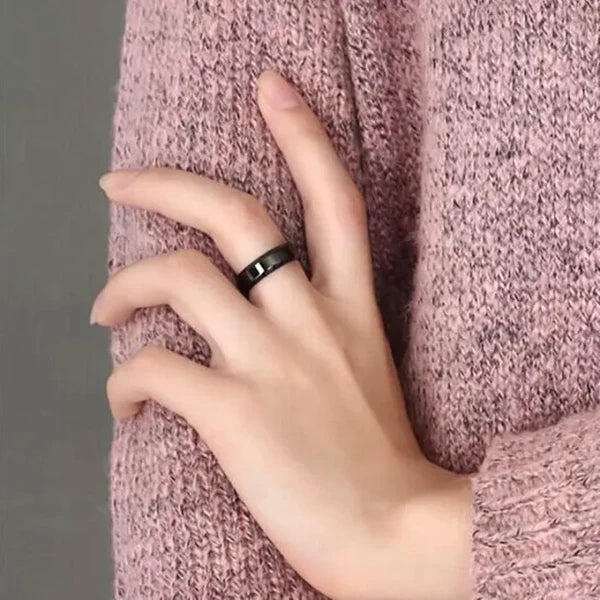 a close up of a person holding a pink tie 